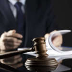 Defense Lawyer reading papers