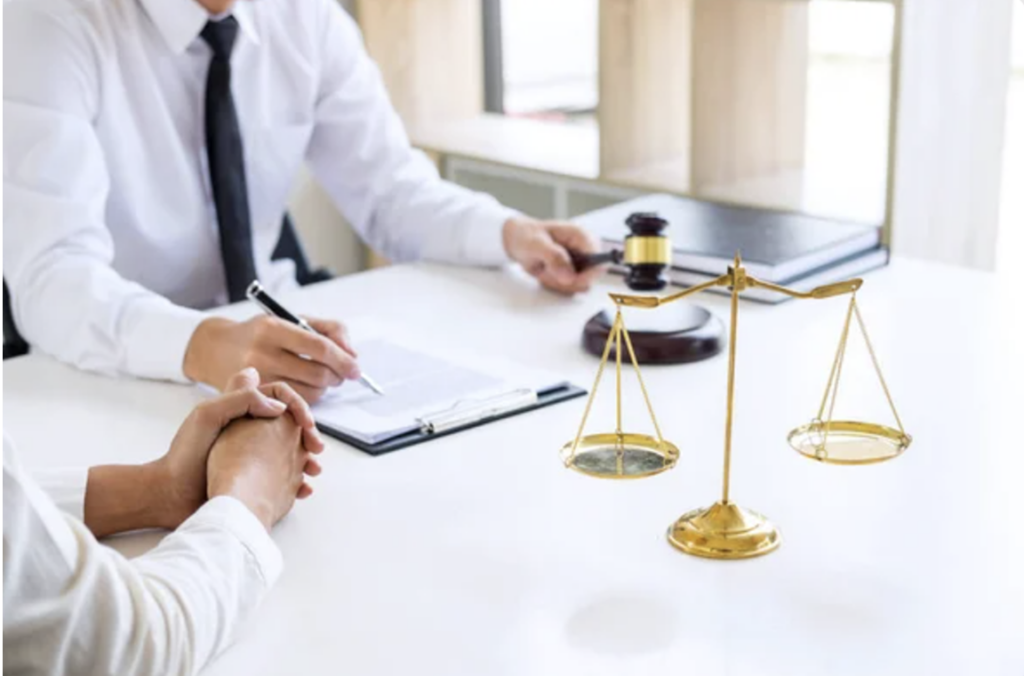 Experienced Brooklyn defense lawyer working with a client