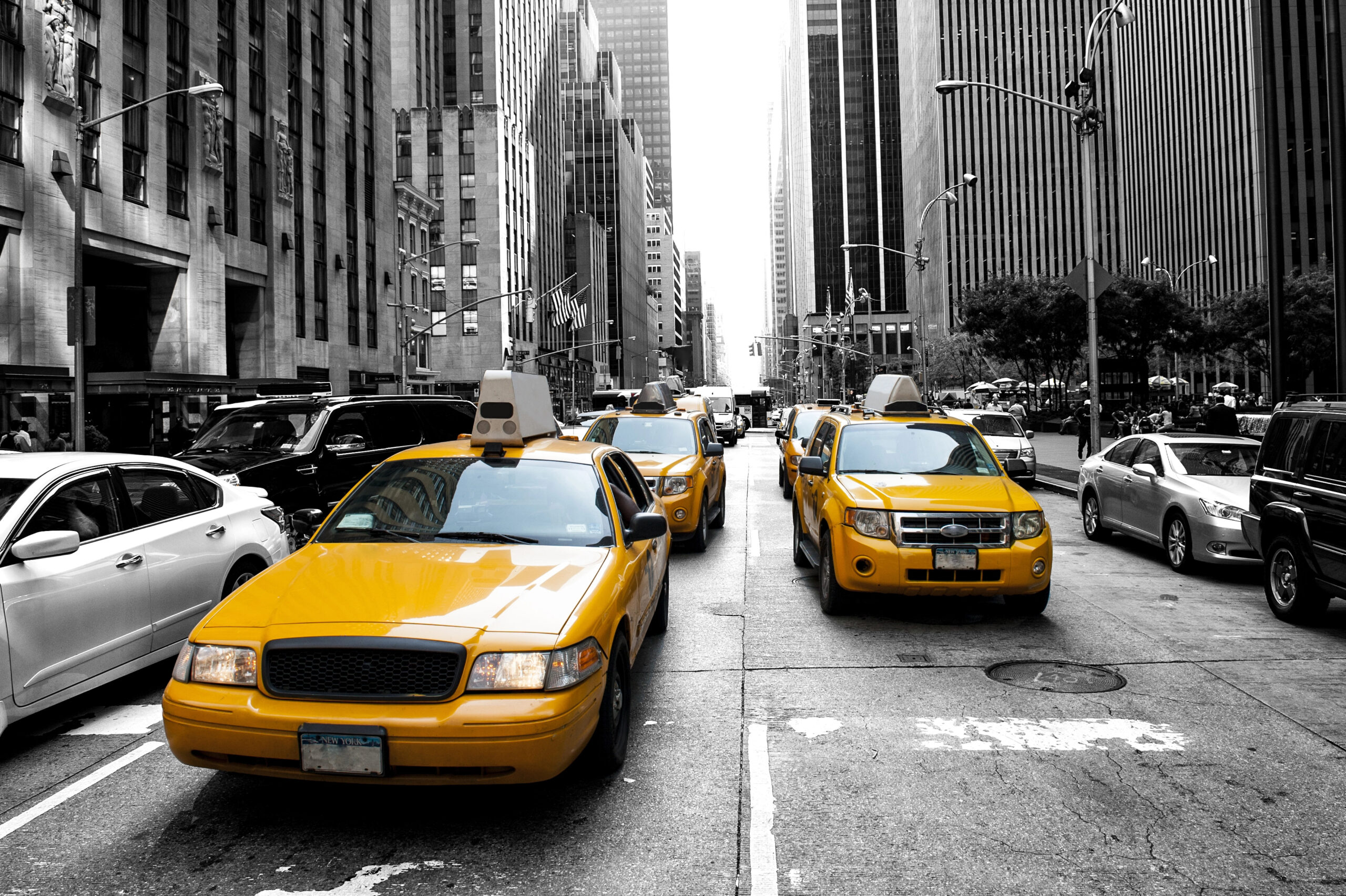 Two YC taxis on the street of Manhattan