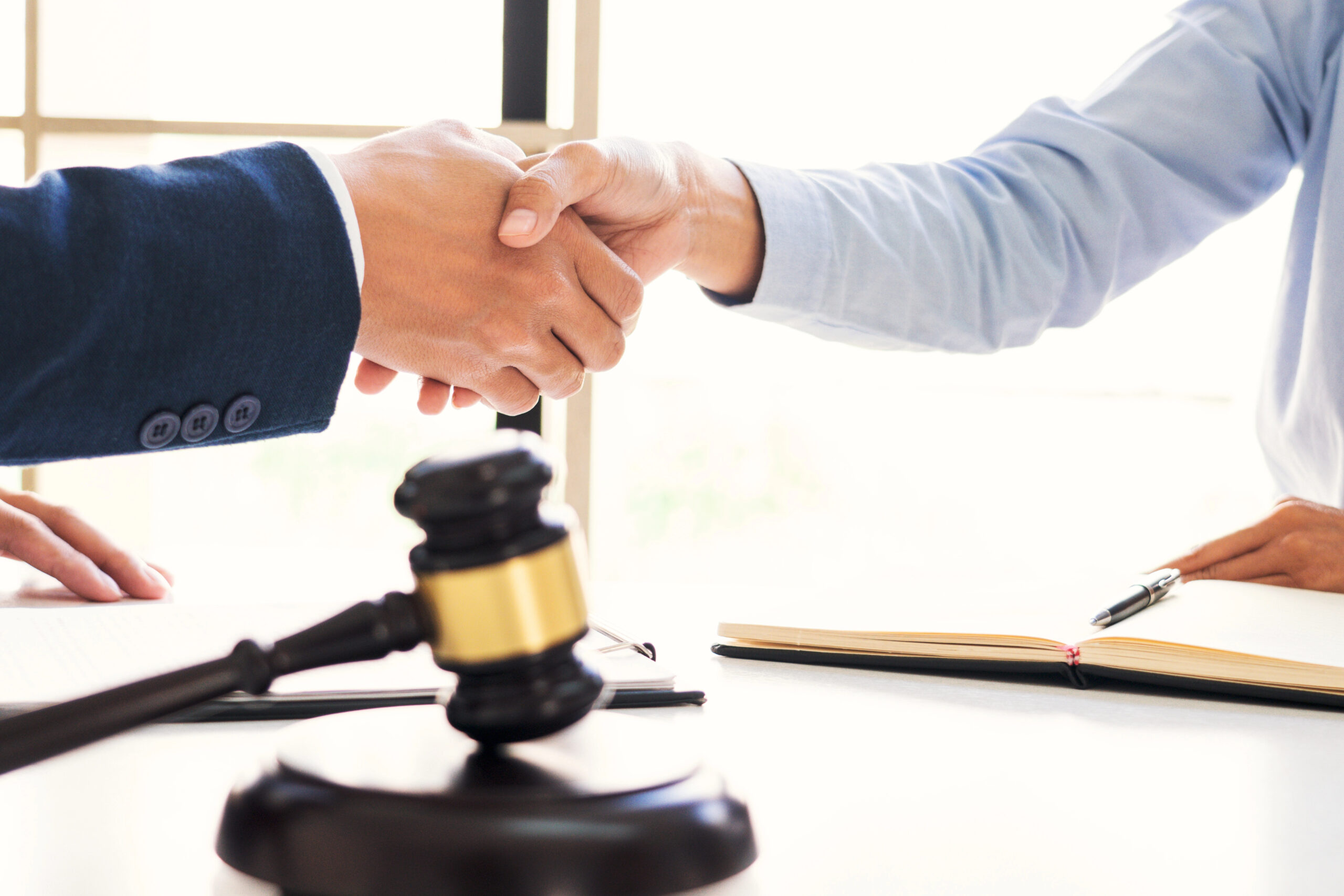 Lawyer for Arraignment in office settleling a case